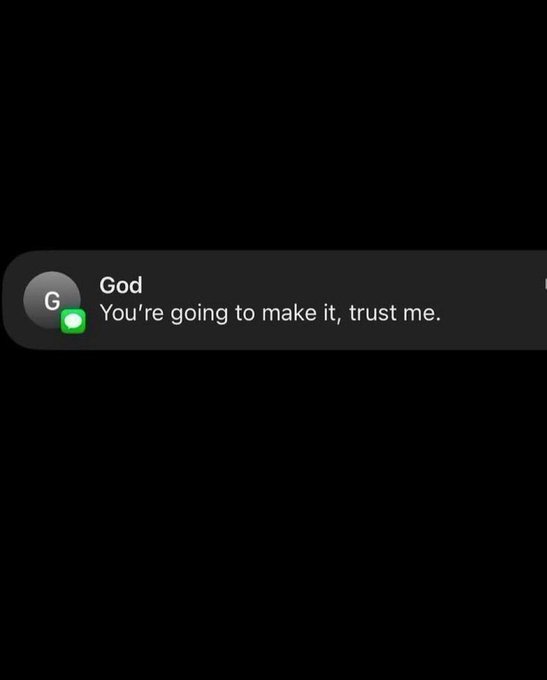 A screenshot of a text message notification from 'God' saying 'You're going to make it, trust me.' on a dark background.