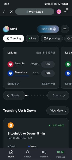 A mobile screenshot of the "world.xyz" website displaying sports betting markets, including a La Liga match between Levante (20.00x, 5%) and Barcelona (1.16x, 86%), with a "Bitcoin Up or Down - 5 min" prediction market below.