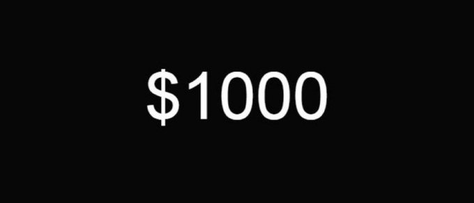 Simple white text reading '$1000' displayed on a black background.