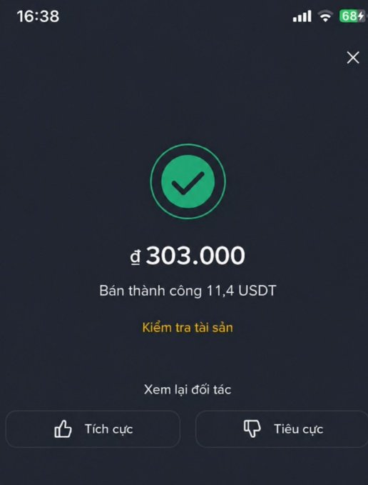 A mobile app confirmation screen in Vietnamese showing a successful transaction of 11.4 USDT for 303.000, with buttons for 'Tích cực' (Positive) and 'Tiêu cực' (Negative) feedback.