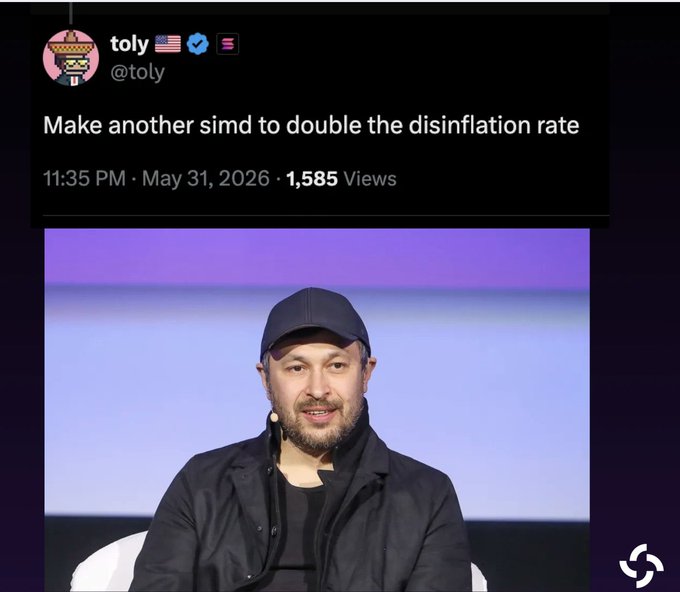 The image features a man sitting behind a desk wearing a baseball cap. The background includes a banner with text discussing making another simplification for double the disinflation rate, which references a social media post by Toly who tweets about inflation and tokenomics.