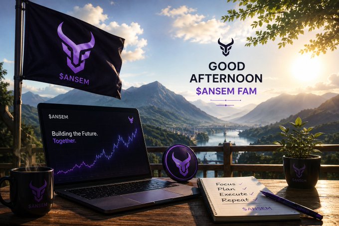 A promotional graphic featuring the $ANSEM brand with a bull logo, displaying 'GOOD AFTERNOON $ANSEM FAM' against a mountain landscape, alongside a laptop showing 'Building the Future. Together.' and a notebook with 'Focus ✓ Plan ✓ Execute ✓ Repeat'.
