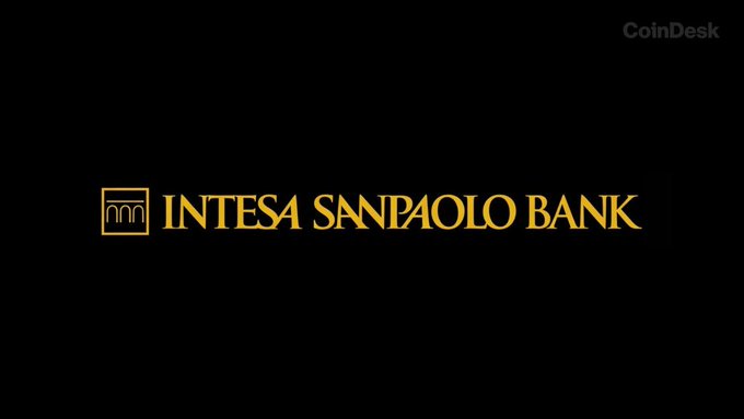 The image displays the Intesa Sanpaolo Bank logo in gold text on a black background, accompanied by a CoinDesk watermark in the upper right corner, visually representing the Italian bank mentioned in the article about its significant reduction of its $IBIT stake and tripling of its $ETH ETF position.