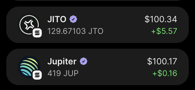 A portfolio view shows holdings of 129.67 JITO valued at $100.34 (+$5.57) and 419 JUP valued at $100.17 (+$0.16), comparing the two Solana ecosystem tokens at nearly equal dollar amounts. The image visually represents the post's comparison of Jito (JTO) versus Jupiter (JUP) as competing "everything apps" on Solana, showing both holdings side-by-side at nearly identical valuations.