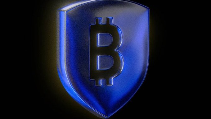 A blue metallic shield displaying the Bitcoin "₿" symbol, symbolizing BitGo's new quantum security protection for institutional Bitcoin wallets.