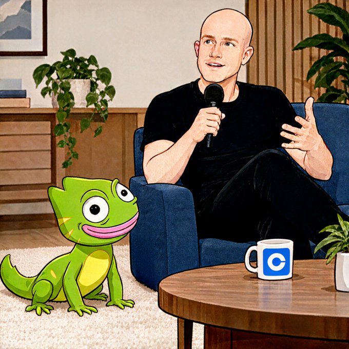 An illustrated cartoon-style scene showing a bald man in a black t-shirt sitting in a blue armchair holding a microphone, with a green cartoon lizard character beside him and a blue mug bearing the letter "C" on a coffee table.