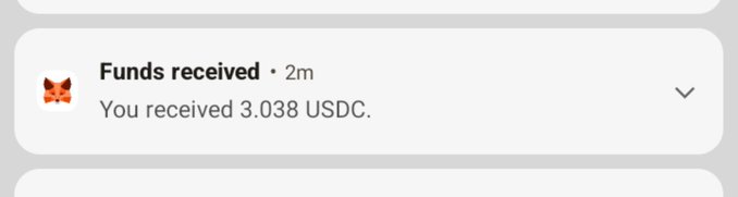 A notification from MetaMask showing a funds received alert of 3.038 USDC, sent 2 minutes ago.