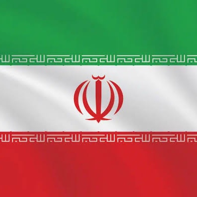The Iranian flag features prominently in the image, with its green, white, and red horizontal bands and the stylized red emblem at the center, visually connecting to the news about Iran's reported proposal to reopen the Strait of Hormuz and restart diplomatic talks with the U.S.
