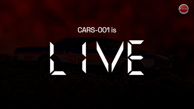 A dark, moody banner with a red background and a faint silhouette of a car displays the text 'CARS-001 is LIVE' in bold white letters, with a small 'Cars' logo in the top right corner.