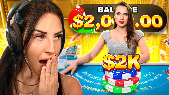 A Fantaslots promotional banner featuring a woman at a blackjack table with a $2,000.00 balance display and '$2K' chips stacked in the foreground.