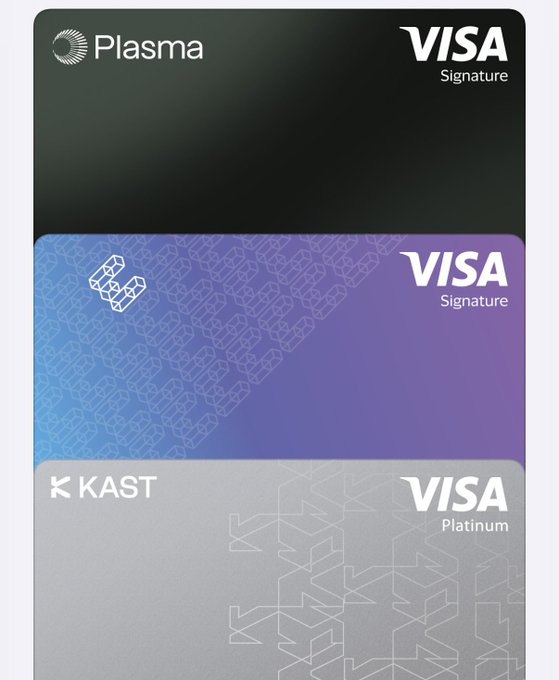Three stacked crypto Visa cards from Plasma, another Visa Signature card, and a KAST Visa Platinum card.