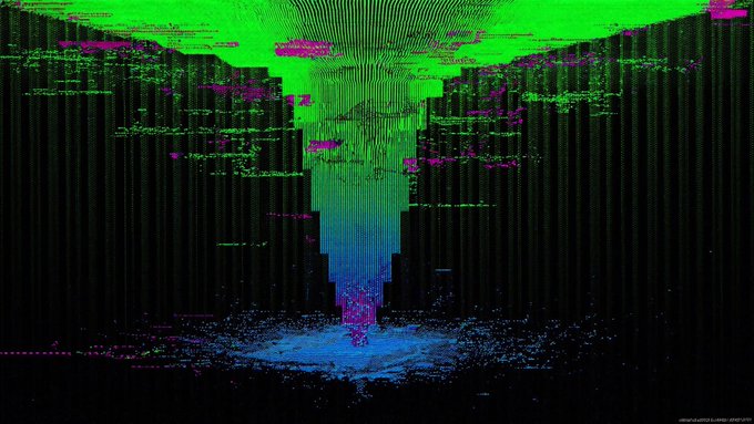 A glitch art image featuring vertical distortion lines and blocks of vibrant green, magenta, and blue against a black background. Text in the corner reads 'VIRTUAXLIMITED.GITHUB.IO/PROTO'.