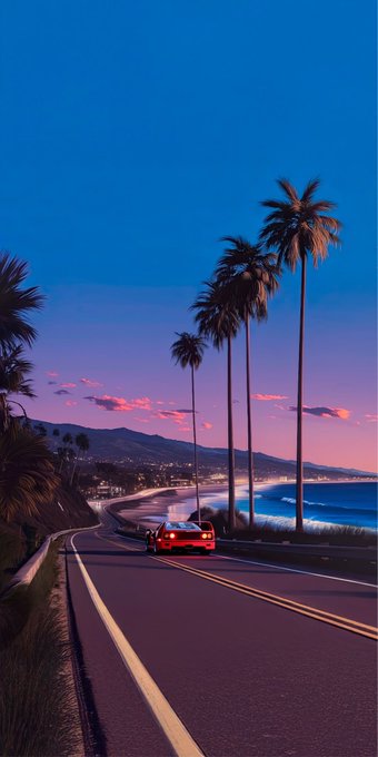 A red sports car drives along a coastal highway lined with tall palm trees at twilight, with the ocean visible to the right and distant mountains on the horizon. The sunset-lit sky and scenic Pacific Coast drive complement the morning's adventurous, freeing energy.