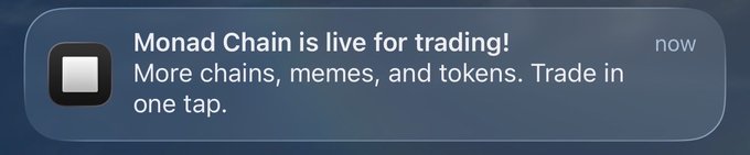 A mobile notification from an app reads 'Monad Chain is live for trading! More chains, memes, and tokens. Trade in one tap.'