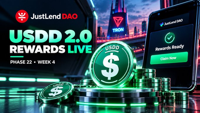 A promotional banner for 'JustLend DAO' featuring 'USDD 2.0 REWARDS LIVE', 'PHASE 22 • WEEK 4', with a smartphone showing 'Rewards Ready' and stacks of USDD coins.