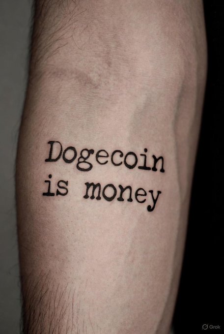 Grok-generated image of a person's forearm tattoo reading 'Dogecoin is money' in typewriter-style black ink.