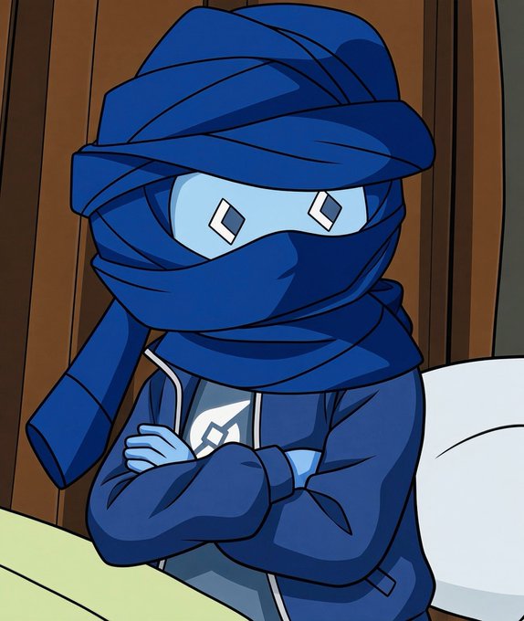 A cartoon character wrapped in blue ninja-like bandages with diamond-shaped eyes and arms crossed.
