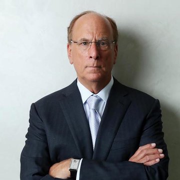 A distinguished older man in a navy suit, light blue tie, and glasses stands with arms crossed, projecting a serious demeanor. The image likely depicts a BlackRock executive, connecting to the news that BlackRock ETF clients have sold $42.86 million worth of ETH.
