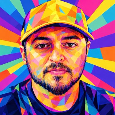 A colorful pop-art style portrait of a bearded man wearing a yellow cap, rendered in geometric triangles against a vibrant rainbow sunburst background.
