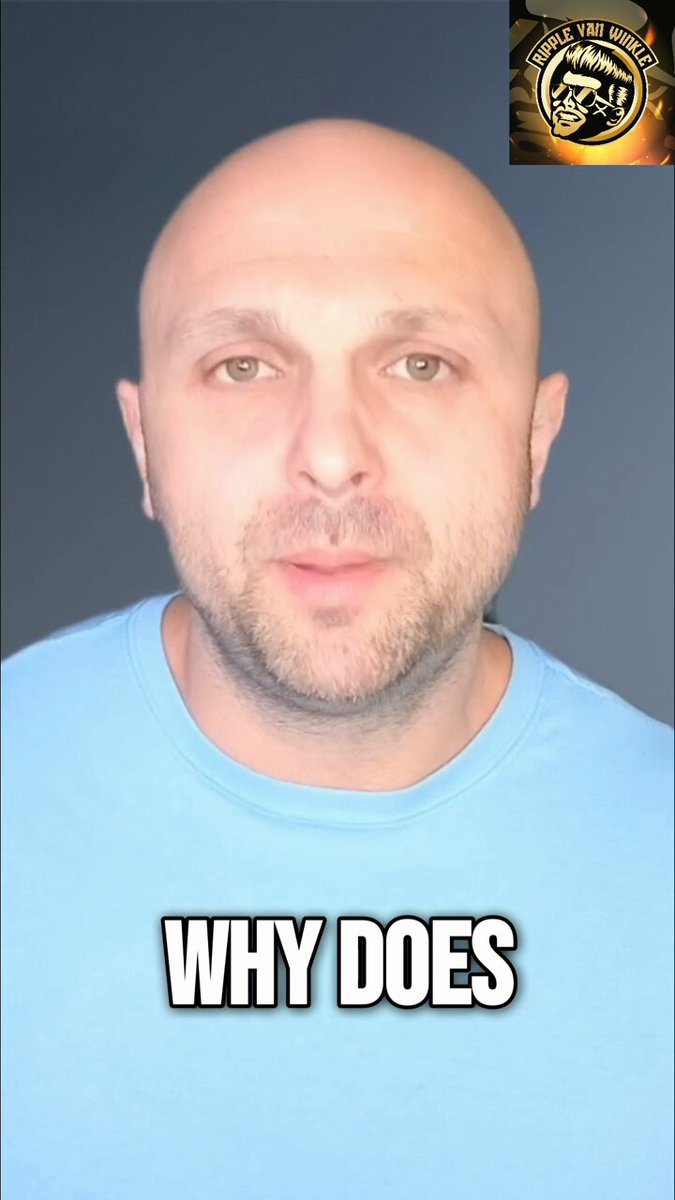 The image shows a man wearing a blue shirt with "Why does?" written above him, and there's an overlay of a coin on his shoulder suggesting he might be making a point about the cryptocurrency RippleNet or the Bank of America's processing power for RippleNet transactions. The background is black, which contrasts with the white text used to convey the message in the image. The caption reads: "Bank of America processes $450 trillion annually and just officially confirmed their RippleNet partnership. The ground is moving."