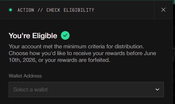 The image shows an email screen with a message from a company named "action", which appears to be a check for eligibility. The email contains a green checkbox that reads "You're Eligible" followed by instructions on how to select a wallet address, likely for receiving rewards before June 2026 or after the payment of the check.