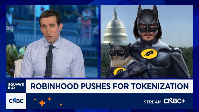 A CNBC Squawk Box segment features anchor Andrew Ross Sorkin at his desk alongside a graphic showing a Batman/cat duo superhero mashup with the headline "ROBINHOOD PUSHES FOR TOKENIZATION." The superhero imagery cleverly riffs on the post's call for Robinhood to "tokenize the world," visually equating the trading platform's bold crypto ambitions with a caped crusader ready to leap into action.