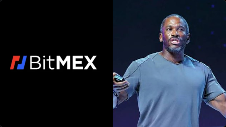 A split image showing the BitMEX logo on the left and a man holding a microphone, appearing to give a presentation on the right.