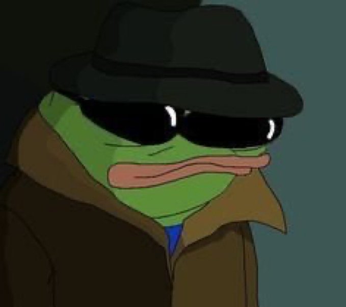The image features a cartoon frog wearing sunglasses and a hat, giving off an impression of being a character from a comic strip or cartoon. The frog appears to be dressed as a criminal, possibly a crook, with a trench coat on. The background is dark blue, which contrasts with the bright colors of the frog's outfit.

The image also contains text that reads: "Crypto has made holding and transferring value fairly easy, but everyday spending still feels unnecessarily complicated for most users. That’s where @KoloHub becomes interesting." This text seems to be related to a discussion about cryptocurrency or digital currency, possibly highlighting the challenges of using traditional payment methods in today's world.