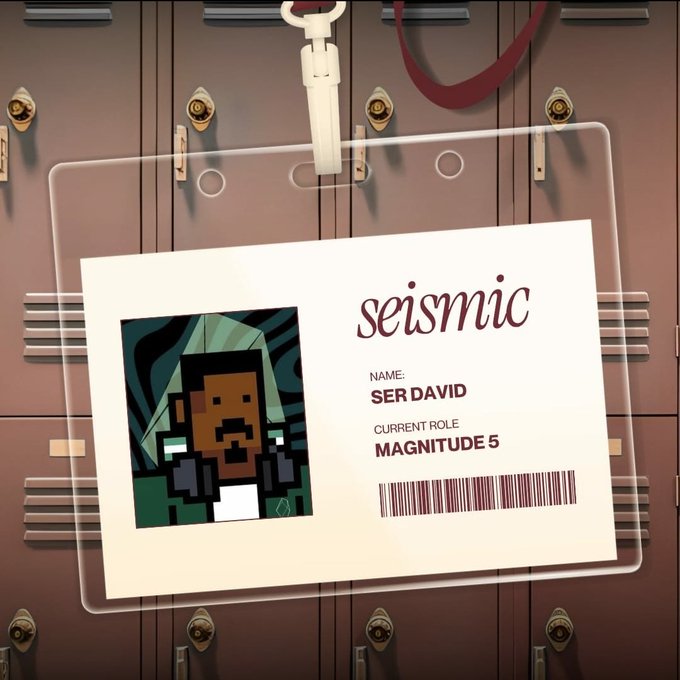 A clear ID badge hanging on lockers featuring a pixelated character portrait, the 'seismic' logo, and the name 'SER DAVID' with the role 'MAGNITUDE 5'.