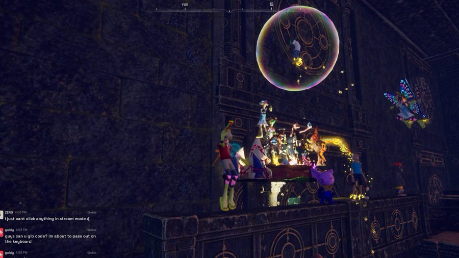 A screenshot from a video game showing a large soap bubble floating above a stone structure with various colorful character avatars gathered, including chat text from users 'godlu' discussing a gib code.