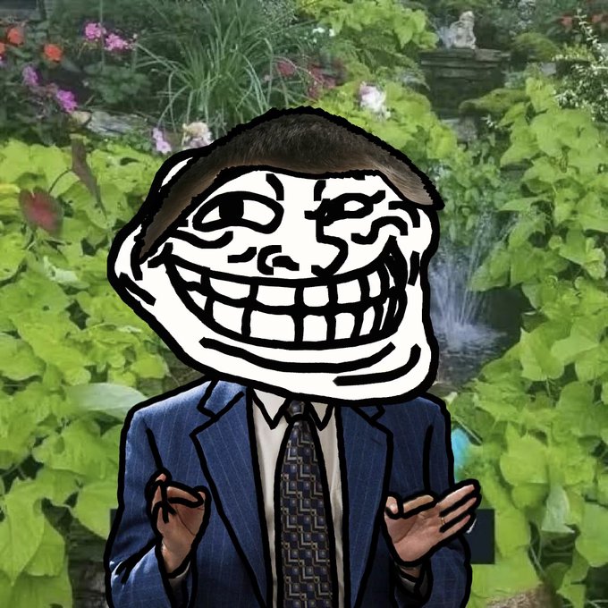 A troll face meme wearing a blue suit and patterned tie is composited onto the body of a person with a bowl haircut, set against a lush green garden background with foliage and a small statue.