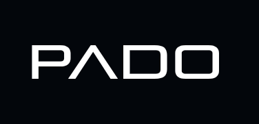 A minimalist logo on a black background featuring the word 'PADO' in a stylized white sans-serif font, where the 'A' is depicted as a pointed triangular shape.