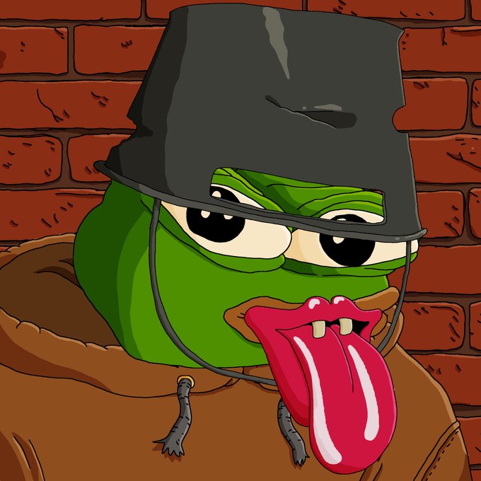 A cartoon green character wearing a black bucket on its head with a pink tongue hanging out, drawn against a brick wall.