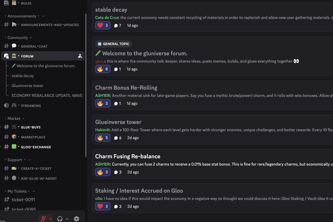 A Discord forum page for the Gluniverse server displays several active discussion threads, including "stable decay" by Cata de Cruz, "Welcome to the gluniverse forum!" by oluk, "Charm Bonus Re-Rolling" by ASHER, "Glueinverse tower" by HakimX, "Charm Fusing Re-balance" by ASHER, and "Staking / Interest Accrued on Gloo" by cOs, all showing engagement within the past day or two. The image illustrates the vibrant community engagement mentioned in the post, showcasing active members sharing ideas about the $GLUE ecosystem and Gluniverse game's economy.