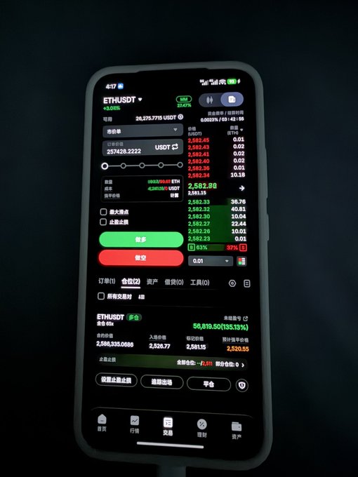 A smartphone displays the OKX cryptocurrency trading app showing the ETH/USDT perpetual futures pair trading at approximately 2,582.88 USDT, with an account holding 59,819.50 USDT in positions. The post's mention of a "6-knife liquidation" likely refers to six-figure liquidations, illustrating the trader's resilience and commitment to continuing leveraged Ethereum trading despite past setbacks.