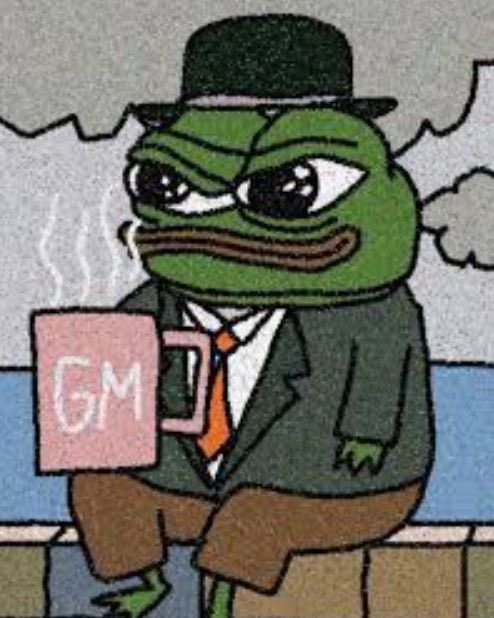 A sad Pepe the Frog meme character wearing a black hat, suit, and orange tie, holding a pink mug labeled 'GM' while sitting on a brick ledge.