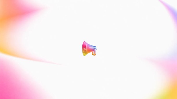 A colorful pink and yellow megaphone icon centered on a white background with soft, blurred rainbow-colored light effects radiating from the corners.