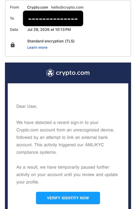 A user is questioning the legitimacy of an email claiming to be from Crypto.com (Crypto.com) with the sender address "hello@crypto.com," dated July 29, 2026 at 10:13PM. The email, which uses standard TLS encryption, warns of a sign-in from an unrecognized device and an attempt to link an external bank account, prompting the user to click a "VERIFY IDENTITY NOW" button. The accompanying post expresses doubt, finding the email suspicious due to its "shady" appearance and questioning whether the address is genuine.