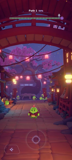 The image shows a cartoon scene with a group of small green creatures, possibly representing characters from an anime or video game. The creatures are walking around in front of a bridge that spans across a river. There are at least 13 green creatures visible in the image, scattered throughout the scene. Some of them appear to be interacting with each other and their surroundings, while others seem to be exploring different parts of the area.