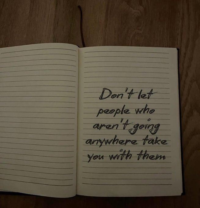 An open lined journal rests on a wooden surface, displaying a handwritten quote in black ink on the right page that reads: "Don't let people who aren't going anywhere take you with them." The motivational message complements the "gm happy 10th of October" post by offering an uplifting, reflective sentiment to start the new day.