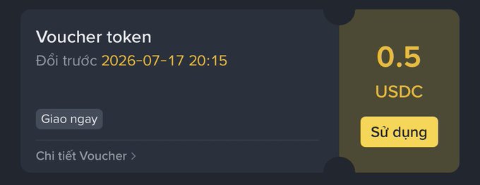 A Binance "Voucher token" notification showing a reward of 0.5 USDC with an expiration date of 2026-07-17 20:15 and an "Sử dụng" (Use) button, illustrating one of the small rewards earned from correctly guessing World Cup football match outcomes during Binance's promotional event.