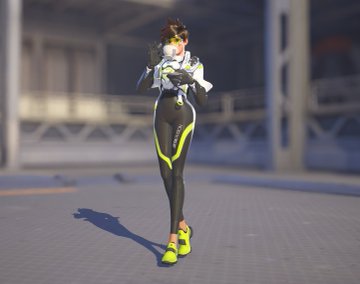 A character from Overwatch 2, likely Tracer, stands in a hangar wearing the yellow and black T1 esports skin paired with the Juno-themed yellow fleece accessories, including the goggles and sneakers. The image showcases the coordinated Juno-themed cosmetic bundles the user purchased, highlighting the bright yellow accents that tie the T1 and Juno skins together.