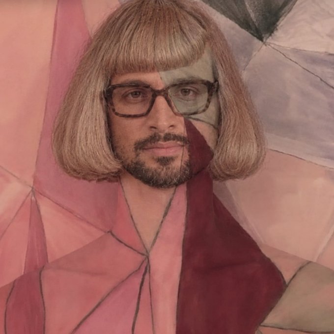 An artistic image blending a photograph of a man with a bob haircut and glasses into a cubist-style painted background with geometric pink and gray shapes.