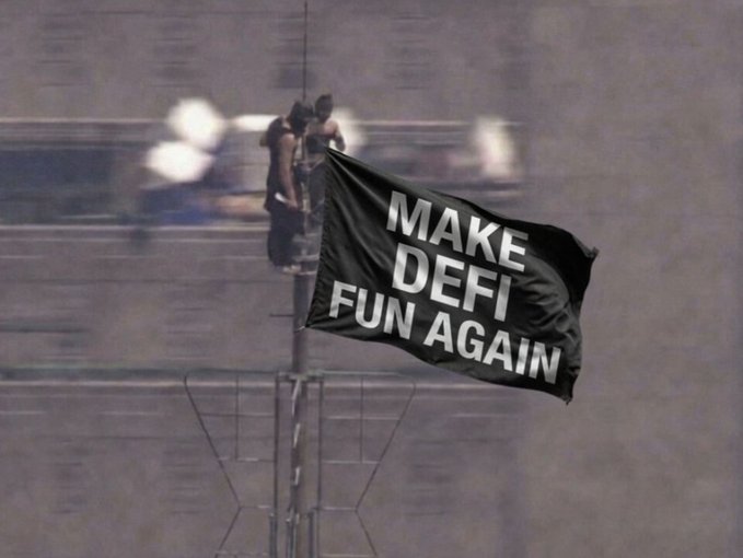 A black flag with white text reading 'MAKE DEFI FUN AGAIN' waving in the air against a hazy gray background.