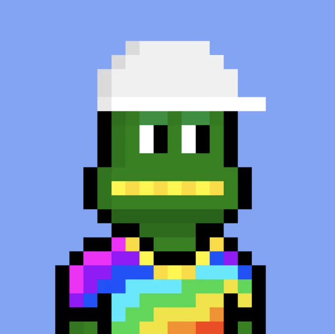 A pixel art green character with a wide yellow mouth and large white eyes, wearing a white cap and a multicolored patterned shirt against a blue background.