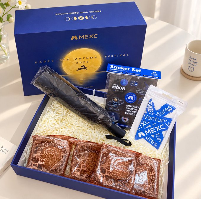 A MEXC Happy Mid Autumn Festival 2026 gift box containing moon cake pastries, an umbrella, stickers, and branded merchandise.