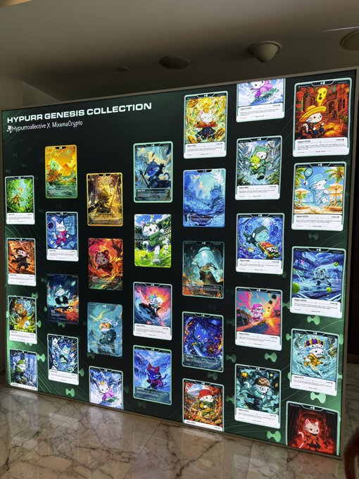 A display board showcasing the 'HYPURR GENESIS COLLECTION' of NFT cards, featuring various illustrated characters and monsters in a grid layout.