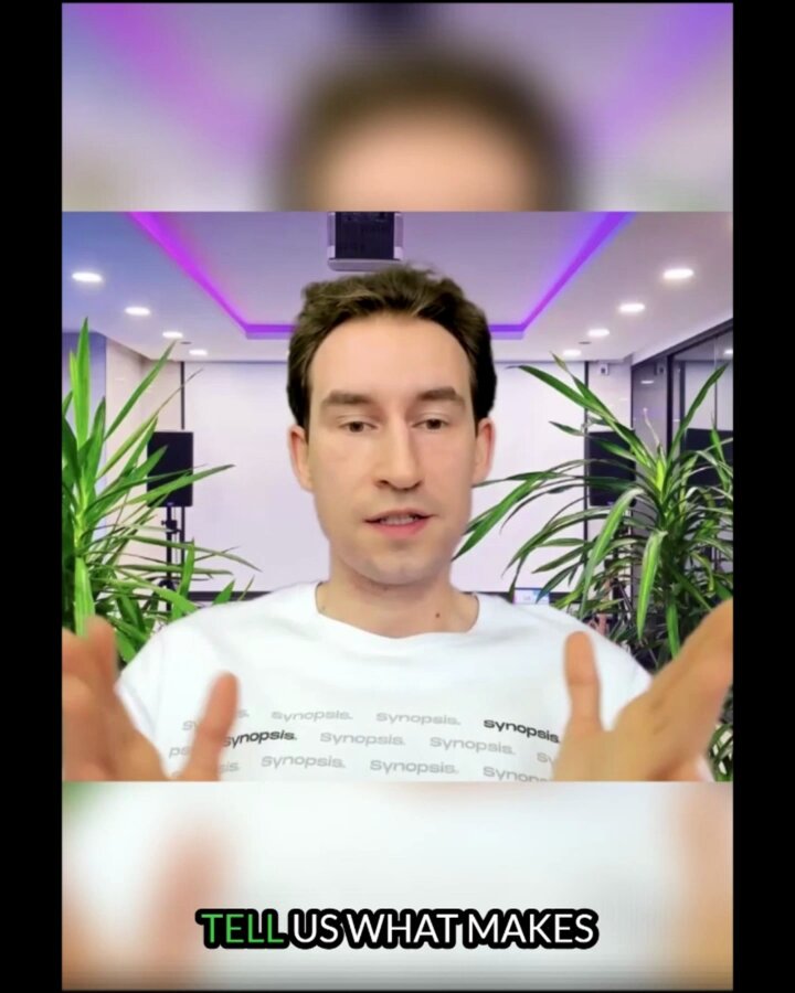 The image features an interview with a man wearing a white t-shirt, who appears to be talking about Synopsis Events. The background of the image shows a room with potted plants placed around the space. There are two people visible in the image - one person is sitting down and another standing up. The text "Tell us what makes" can also be seen in the image.