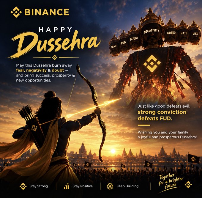 A Binance advertisement celebrating Dussehra, depicting an archer aiming at a multi-headed demon labeled with 'FEAR', 'FUD', 'DOUBT', 'NEGATIVITY', 'GREED', 'HATE', and 'LIES', with text wishing viewers to burn away fear and negativity, and affirmations like 'Stay Strong,' 'Stay Positive,' and 'Keep Building.'