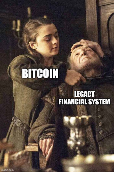 A Game of Thrones meme featuring Arya Stark standing over a wounded man with a knife, labeled 'BITCOIN' for Arya and 'LEGACY FINANCIAL SYSTEM' for the man.